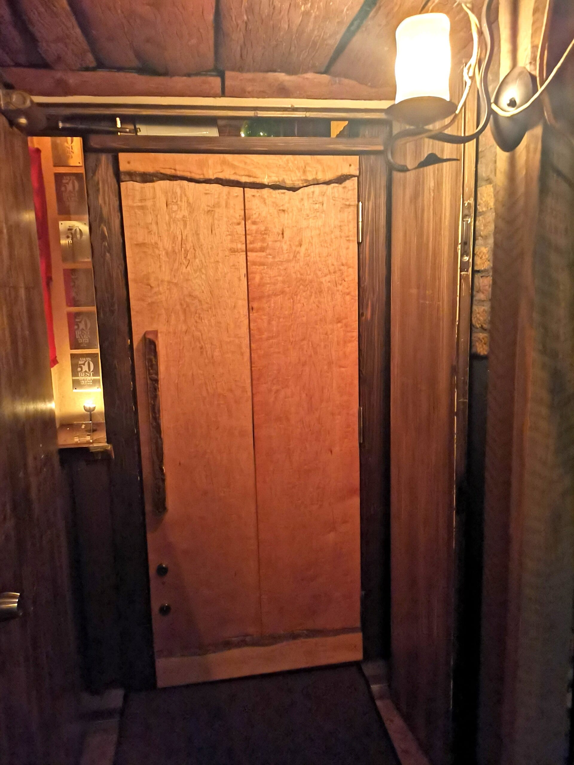 The entrance door of Bar Benfiddich in Nishishinjuku, Tokyo.