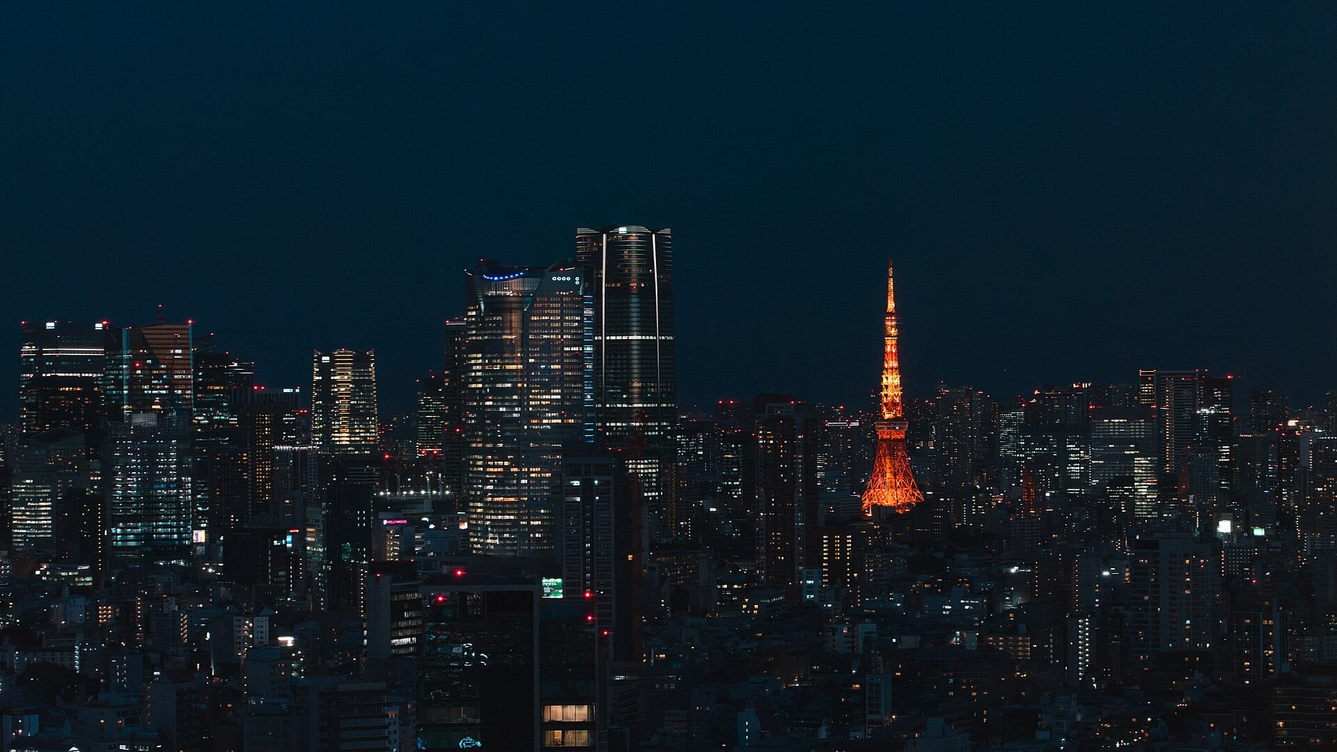 Minato City, Tokyo, at night, with Tokyo Tower among the buildings.